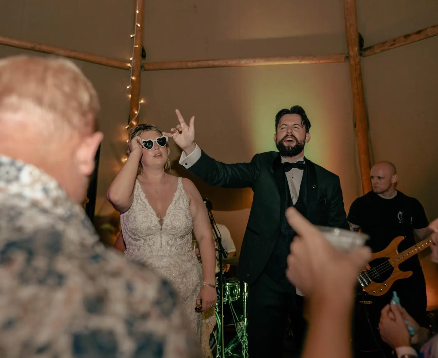 Couple dancing in front of the live band