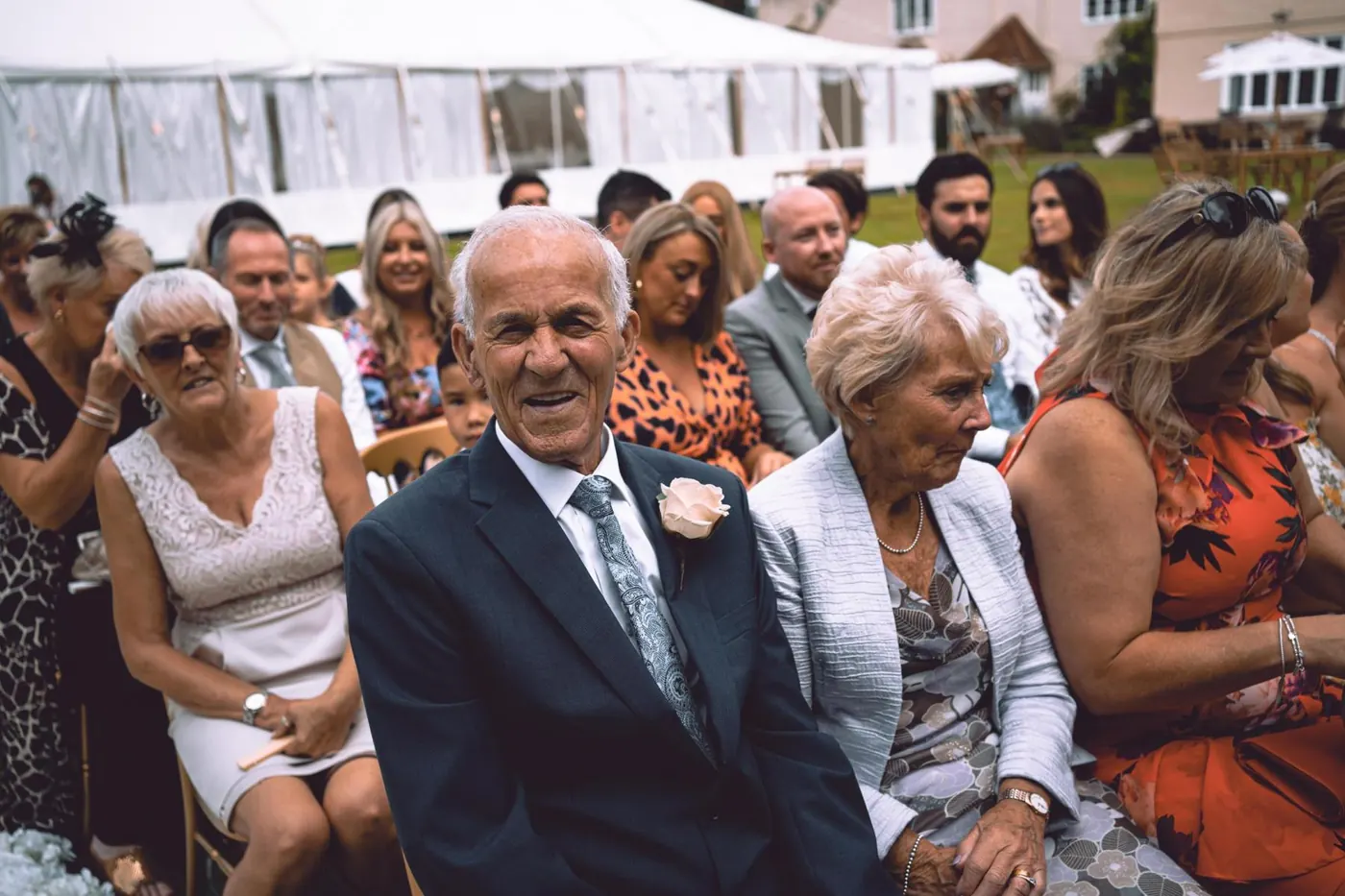Guests watching the ceremony from their seats