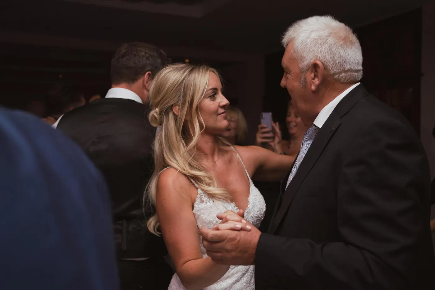 Bride dancing with her father on the dance floor