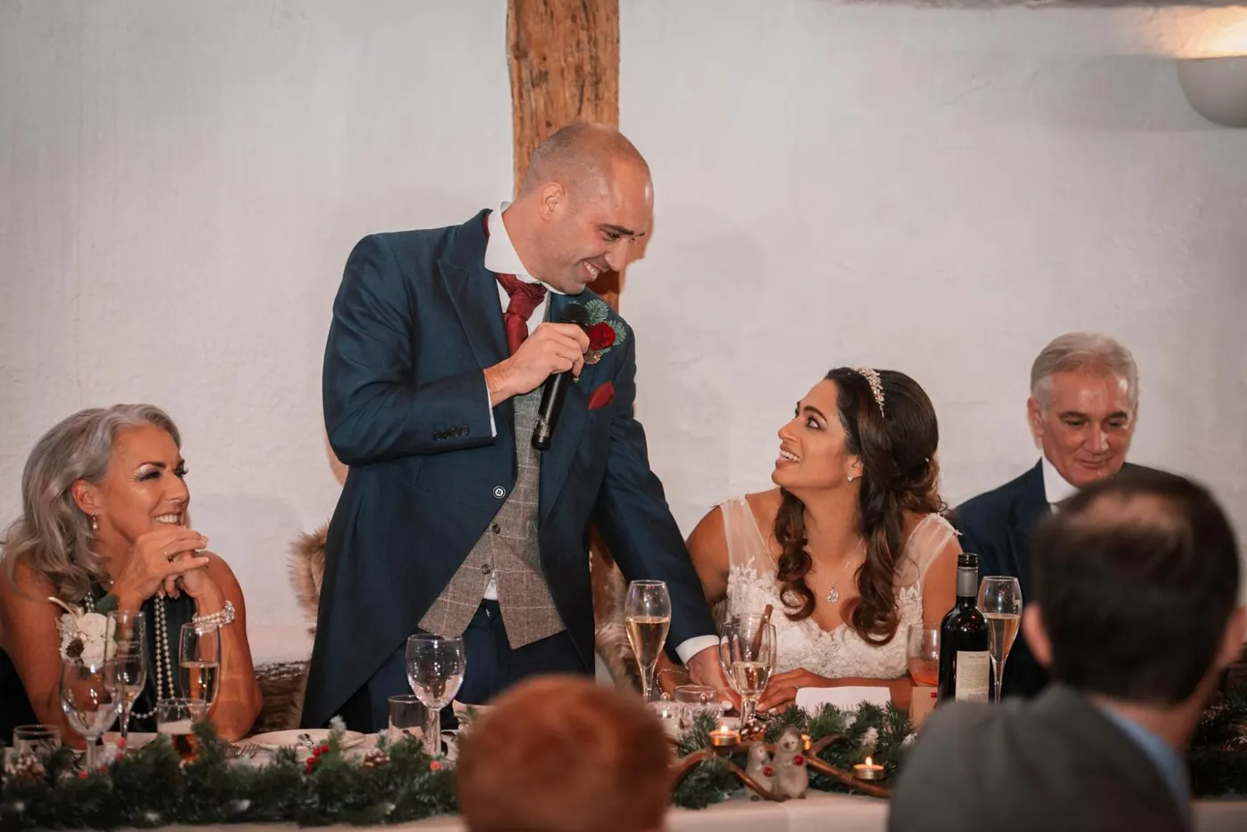 Groom giving his speech at the top table