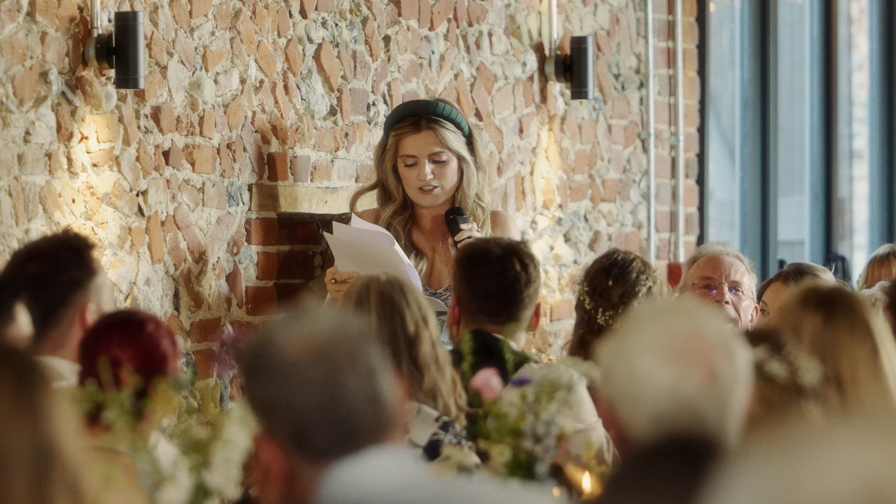 Charlotte giving a speech at the wedding breakfast in Old Hall’s barn