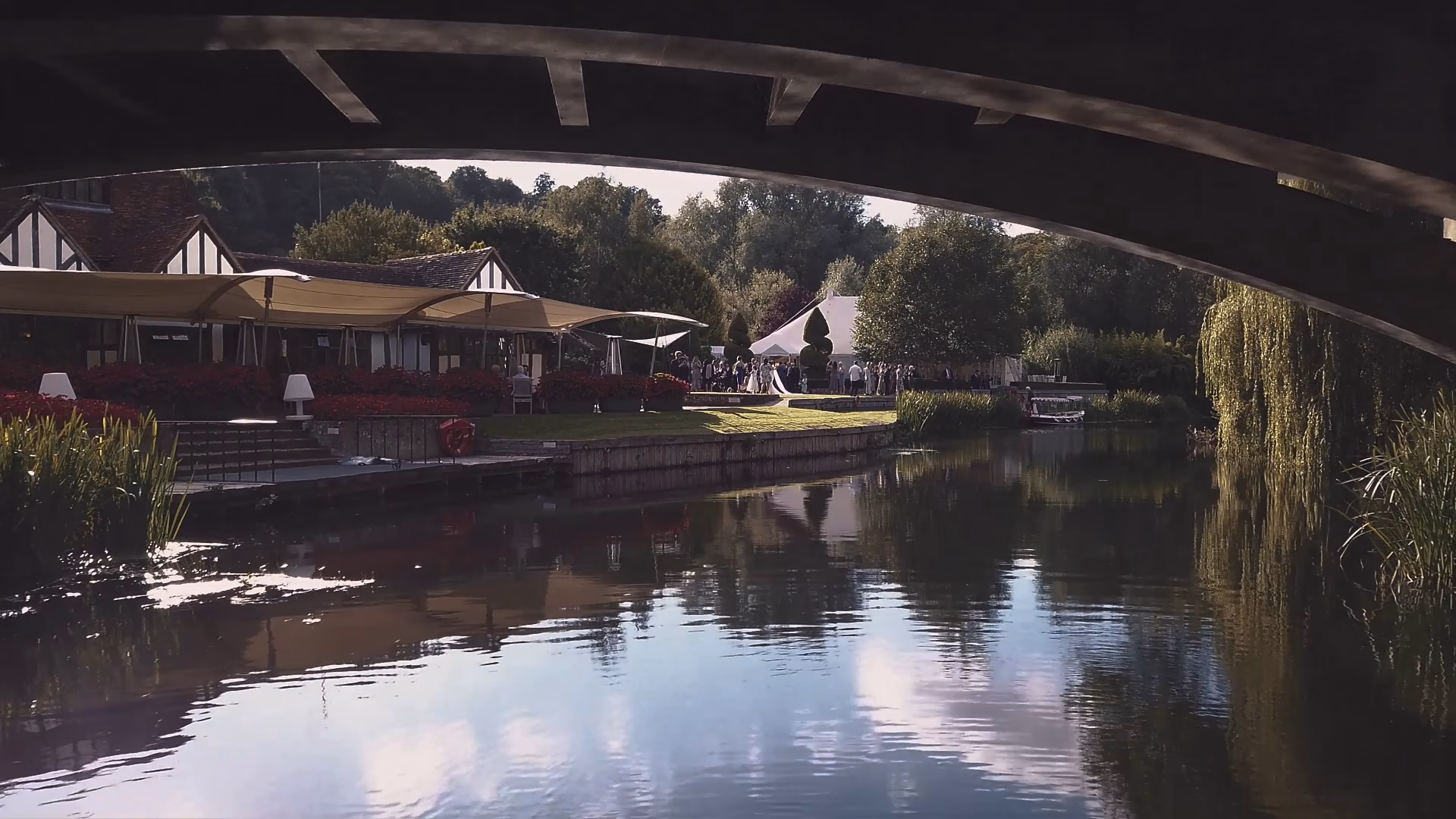 The river and Le Talbooth framed by the bridge — film still