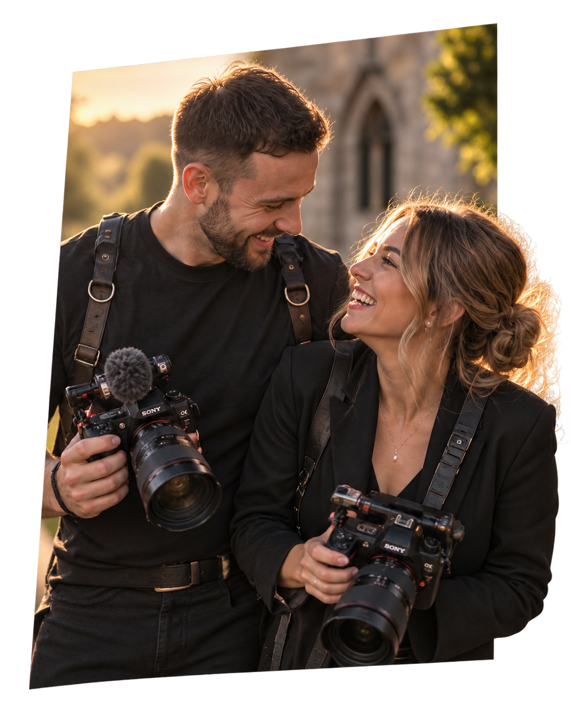 Sam and Sofia together, holding their cameras in the evening sunshine